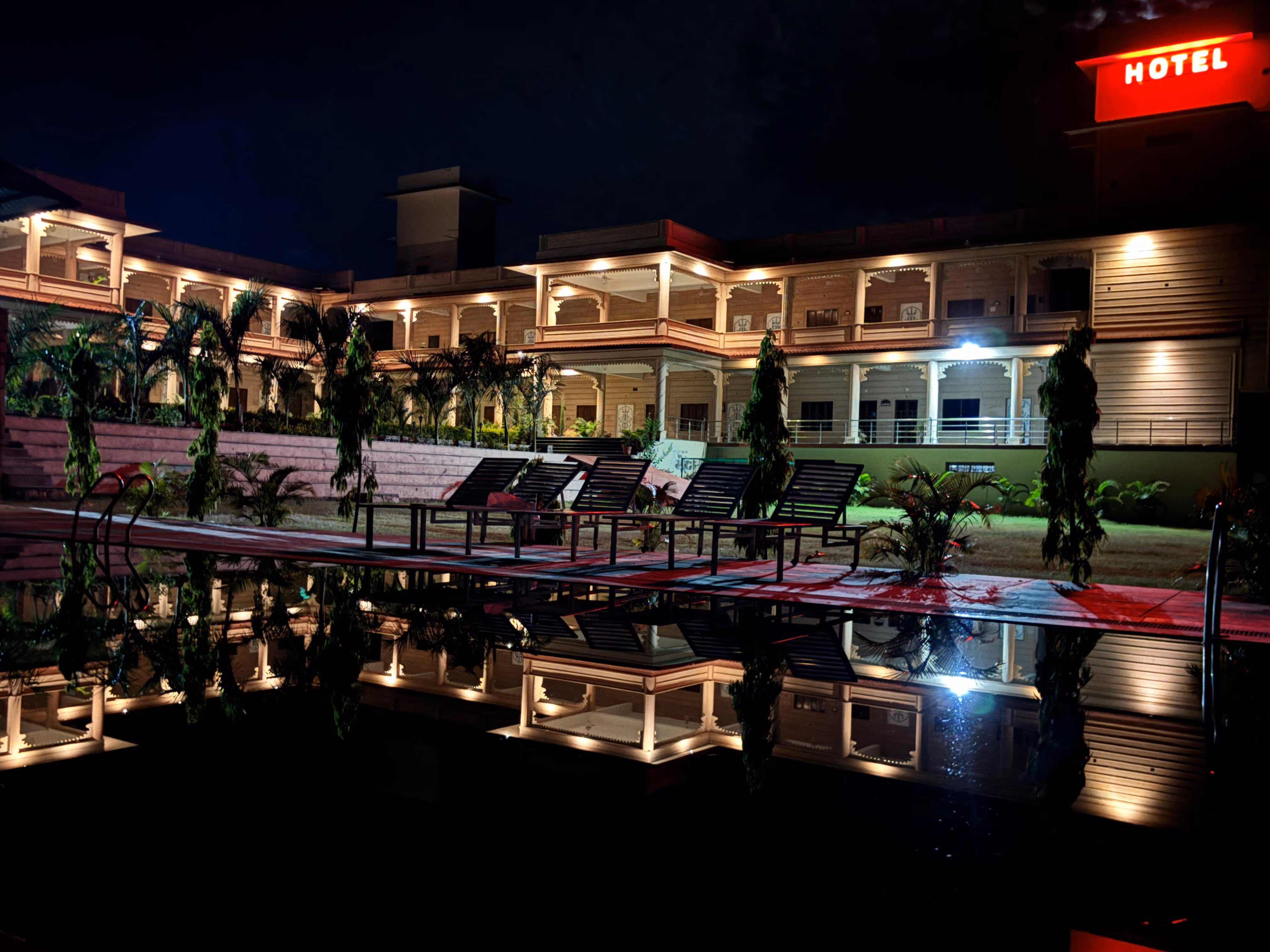 Beautifully lit resort exterior at night